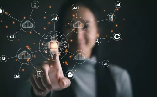 Finger pressing virtual network of business icons representing change management